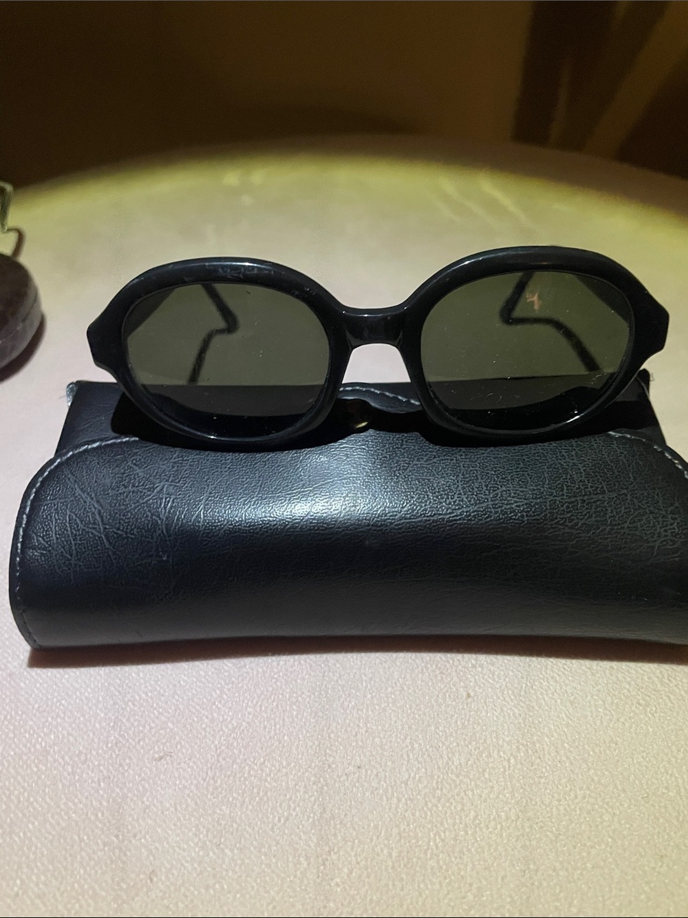Jones New York Black Oval Sunglasses with Dark Green Lenses